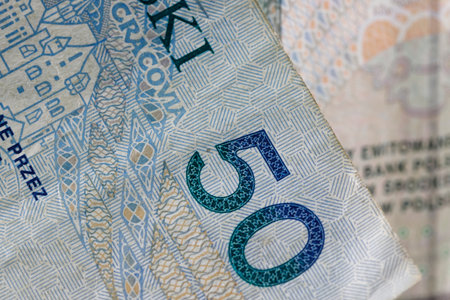 Polish money. Polish zloty banknotes placed next to each other can be used as illustrations for many various financial issues. PLN currency.の写真素材