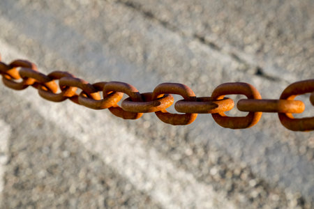 The barrier here is made of thick steel chain that has rusted, as you can see in Florence, Italyの写真素材