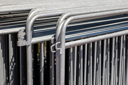 Metal elements for the construction of temporary protective fences. They can be used to provide space security in a variety of locations and situationsの写真素材