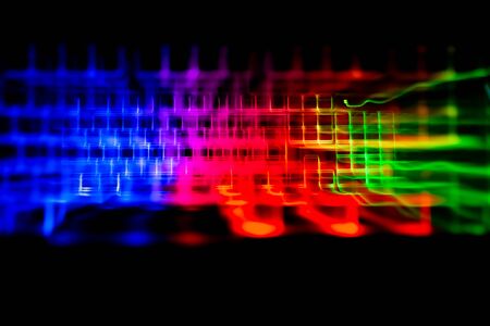 Abstract overlay of color trails keyboardの写真素材