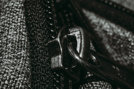 Detail of a zipper on a black background. Close-up.の写真素材