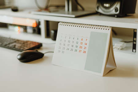Calendar on the office desk, planning for business meeting or travel planning conceptの写真素材