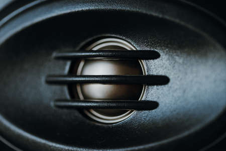 Close up of a speaker in a car. Shallow depth of field.の写真素材