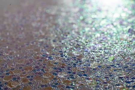 Blue abstract glitter background with shiny bokehの写真素材