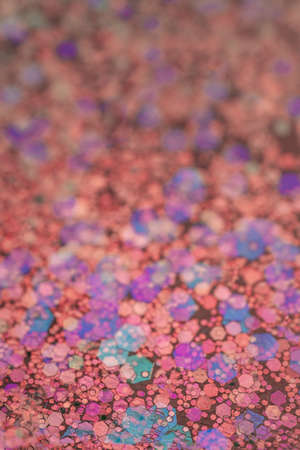 Pink abstract glitter background with shiny bokehの写真素材