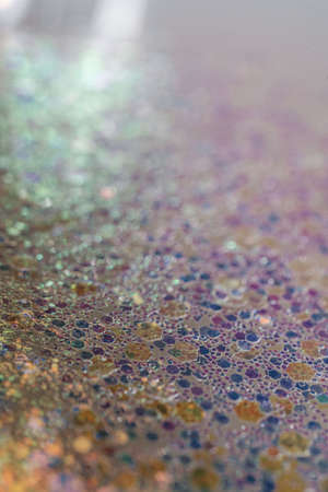 Blue abstract glitter background with shiny bokehの写真素材