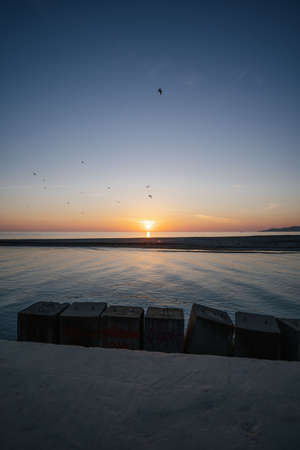 Beautiful sunset landscape on the blue sea.の写真素材