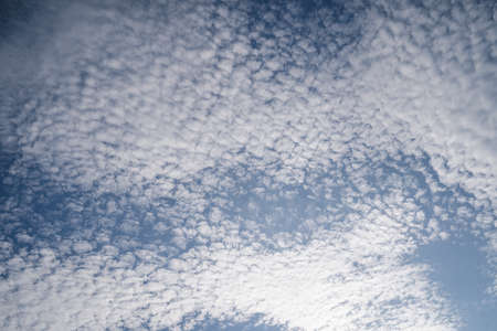Natural background with blue sky and white clouds.