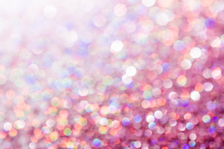 Abstract sequin background with shining festive bokeh.の写真素材