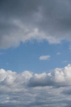 Natural background with blue sky and white clouds.