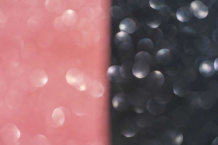 Black and pink abstract glitter background with shiny bokehの写真素材