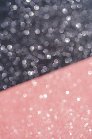 Black and pink abstract glitter background with shiny bokehの写真素材
