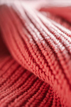 Knitted texture of a pink sweater or scarf close-up.の写真素材