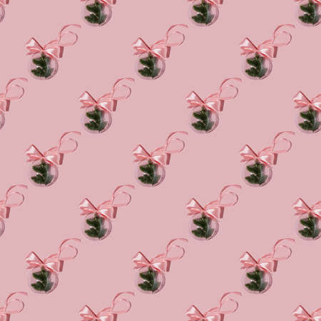 A balloon with a Christmas branch on a pink background. Pattern.の写真素材