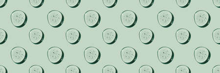 A pattern of cosmetic drops on a green natural background.の写真素材