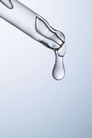 Pipette with serum, gel, oil or other cosmetic product.の写真素材
