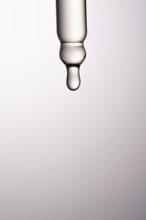 Pipette with serum, gel, oil or other cosmetic product.の写真素材