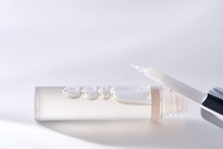 A pack of brow gel or clear lip gel in a pack with a brush.の写真素材