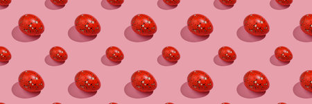 Easter composition pattern in red shades. Painted eggs on a pink background.