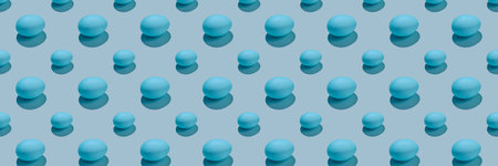 Easter composition pattern in blue shades. Painted eggs on a blue background.の写真素材