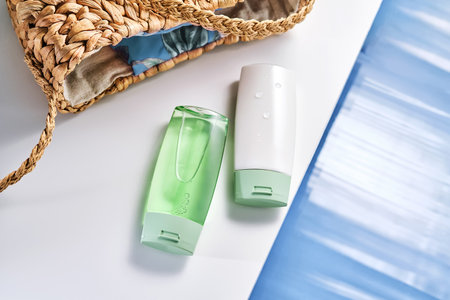Sunscreen and gel by the water pool.