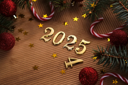 New Year 2025 beige background. Number of the coming year in Christmas decoration.