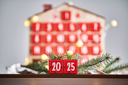 Christmas Advent calendar in the shape of a house with boxes making up the number 2025.の写真素材