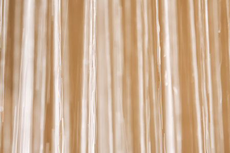 Abstract texture of water jets from the shower in close-up.の写真素材