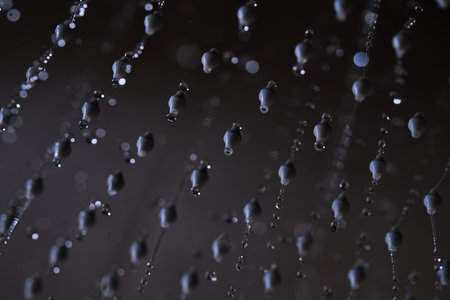 Abstract texture of water jets from the shower in close-up.の写真素材