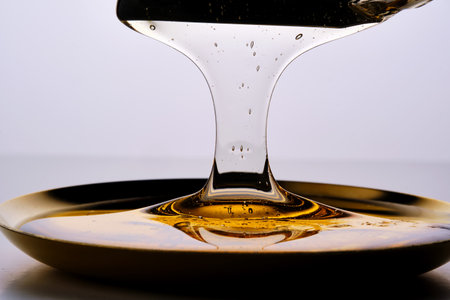 Photo of a sugar paste for depilation hair removal procedure. Texture.の写真素材