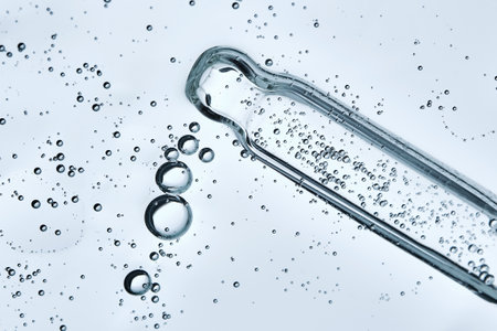 The texture of a serum or cosmetic gel with a pipette. Angle from below.の写真素材