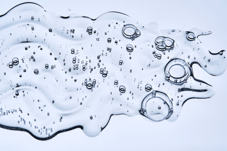 A drop of serum showing the texture of a cosmetic product.の写真素材