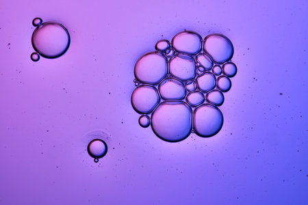 A very beautiful texture of serum or shampoo with bubbles in close-up.