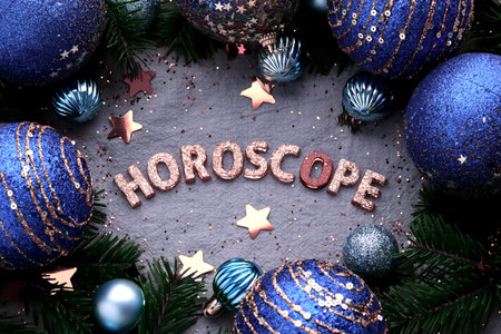 Blue festive background with the inscription HOROSCOPE.の写真素材