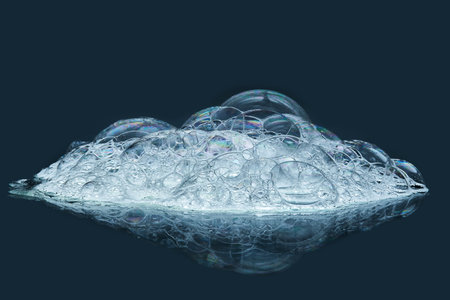 Shampoo bubbles on a blue background.