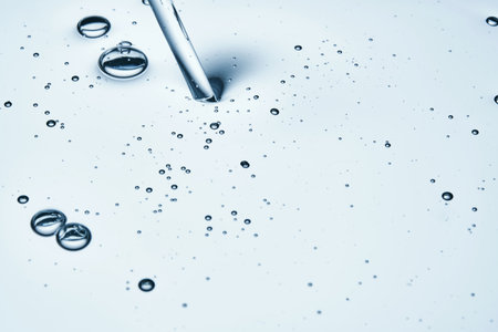 The texture of hyaluronic cleansing for the face or serum in blue tones.の写真素材