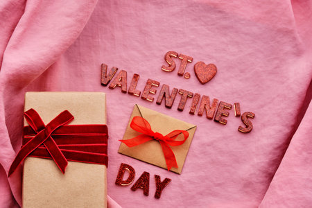 Festive St. Valentines Day background on pink fabric.の写真素材
