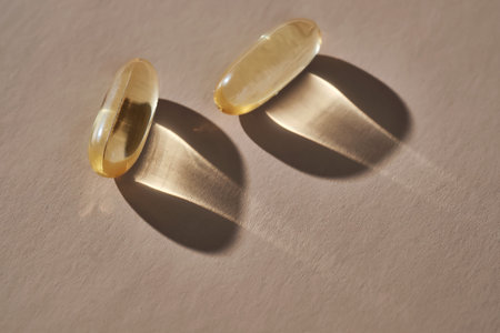 Wellness supplements casting shadows in natural lightの写真素材