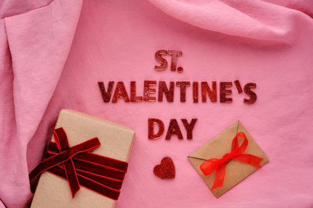 Festive St. Valentines Day background on pink fabric.の写真素材