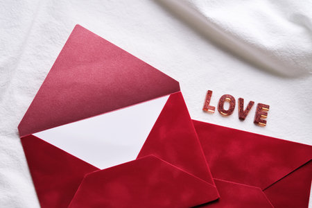 Red envelope revealing love message on valentines dayの写真素材