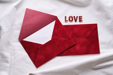 Red envelopes with love letter and textの写真素材