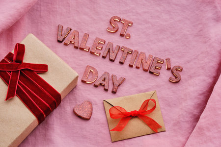 Festive St. Valentines Day background on pink fabric.の写真素材