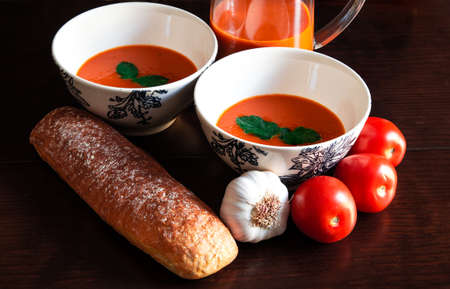 Extremaduran gazpacho. Typical Spanish drink, made with tomato, garlic, pepper, bread and water. Pegetarian and healthy foodの写真素材
