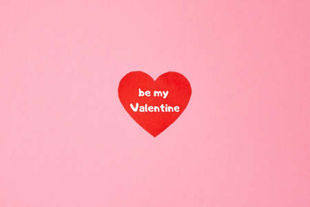 Be my Valentine. Red heart on pink background. Love and valentine conceptの写真素材