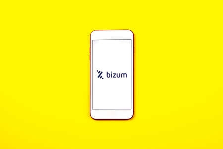 Spain. 02, 03, 2021. Overhead shot of a smartphone with the Bizum application home screen. Instant payment concept with smartphoneのeditorial素材