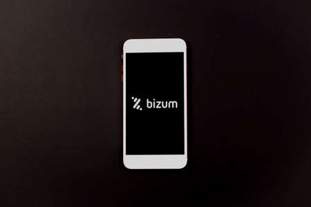 Spain. 02, 03, 2021. Overhead shot of a smartphone with the Bizum application home screen. Instant...