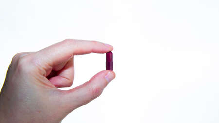 Overhead shot of several pills and a thermometer. Concept of drugs for the treatment of diseases, especiallyの写真素材
