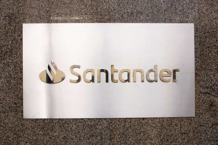 Spain, 03, 04, 2021. In this photo illustration the facade of the Banco Santander.のeditorial素材