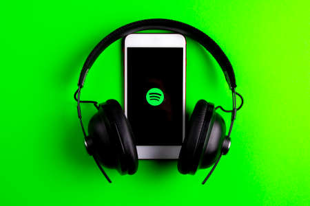 Spain. 03, 05, 2021. An iphone screen showing spotify icon with beats earphone, perfect for...
