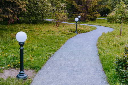 Road and lights in the park. Landscape designの写真素材